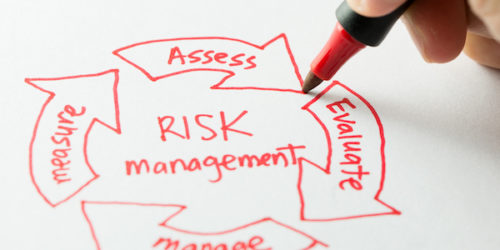 Risk management diagram Risk management flow chart with a red pen
